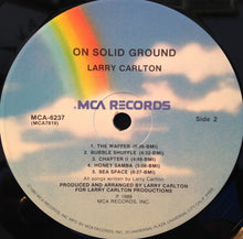 Load image into Gallery viewer, Larry Carlton : On Solid Ground (LP, Album, Pin)