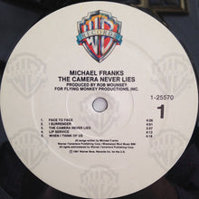 Laden Sie das Bild in den Galerie-Viewer, Michael Franks : The Camera Never Lies (LP, Album, All)