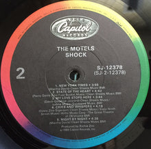 Laden Sie das Bild in den Galerie-Viewer, The Motels : Shock (LP, Album, Jac)
