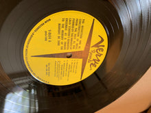 Laden Sie das Bild in den Galerie-Viewer, Lalo Schifrin : The Dissection And Reconstruction Of Music From The Past As Performed By The Inmates Of Lalo Schifrin&#39;s Demented Ensemble As A Tribute To The Memory Of The Marquis De Sade (LP, Mono, Promo, yel)
