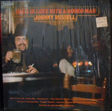 Laden Sie das Bild in den Galerie-Viewer, Johnny Russell (2) : She&#39;s In Love With A Rodeo Man (LP, Album)
