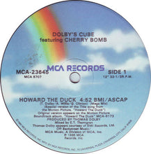 Load image into Gallery viewer, Dolby's Cube featuring Cherry Bomb (2) : Howard The Duck (12", Glo)
