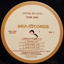 Laden Sie das Bild in den Galerie-Viewer, Elton John : Victim Of Love (LP, Album, Pin)
