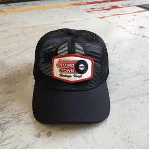 Black mid-crown all mesh Record Town Hat with embroidered Record Town logo patch. Hat is adjustable using plastic snap-back.
