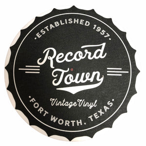 Heavy duty felt turntable slip mat to keep  vinyl steady while playing. The Record Town black bottlecap logo is printed on the slip mat.